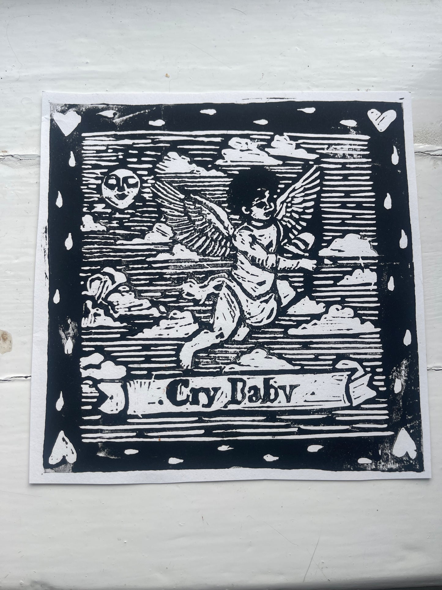 20cm square Lino print of "Crybaby"